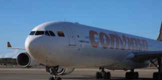 Llegan 304 migrantes a Venezuela en vuelo de repatriación desde México