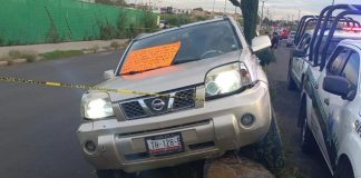 Matan a mujer dentro de camioneta en Tecámac; dejan cartulina en el parabrisas Matan a mujer dentro de camioneta en Tecámac; dejan cartulina en el parabrisas
